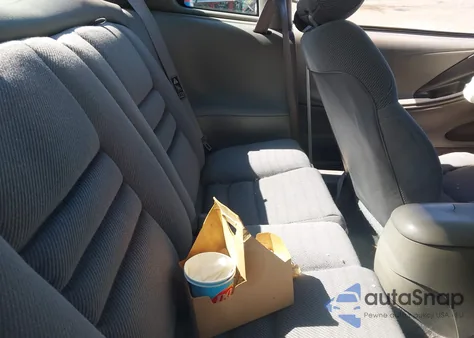 1999 Ford Mustang из США, поврежденный, VIN 1FAFP4040XF136352